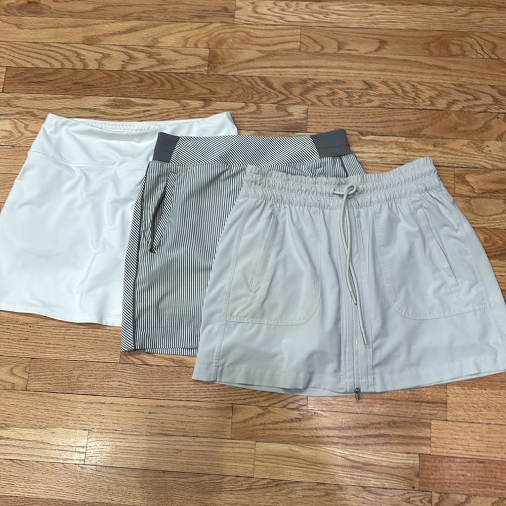 3 Athleta athletic skirts with built in shorts